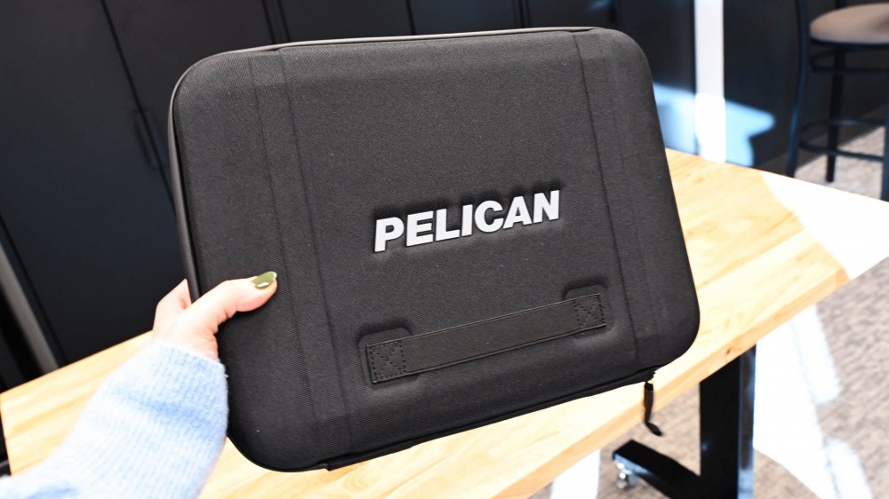 Person holding a Pelican Ranger Series Laptop Case