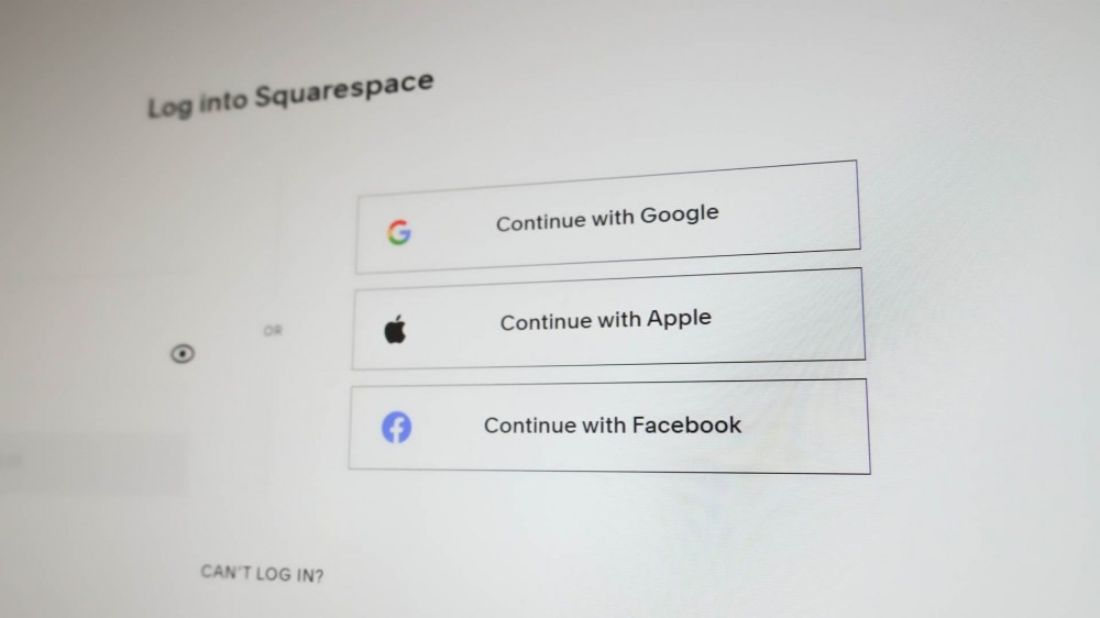 A website asking you to log in with Google, Apple, or Facebook